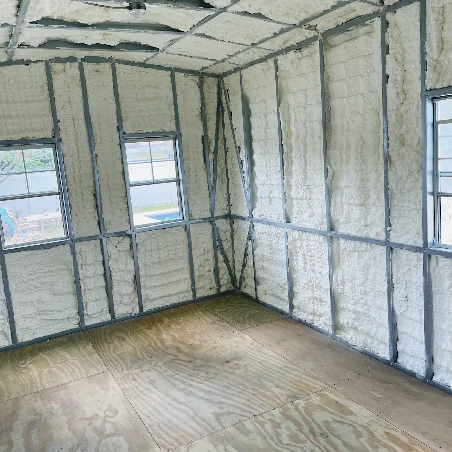 Closed-cell spray foam insulation applied to wall cavities in a residential project in Hollymead